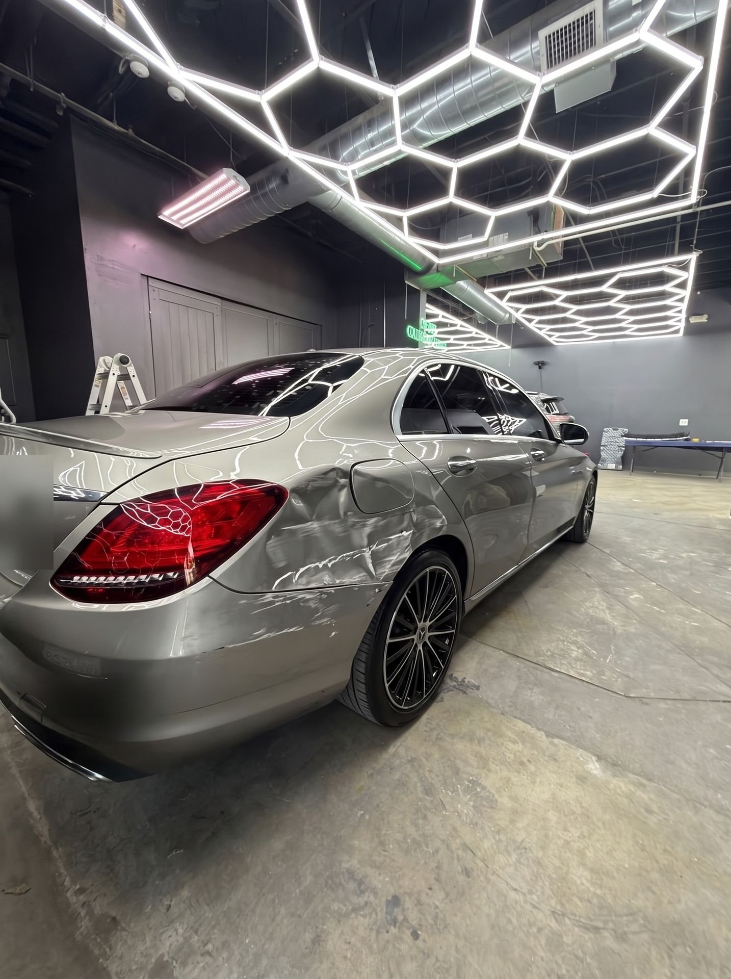 Mercedes C-Class dented quarter panel